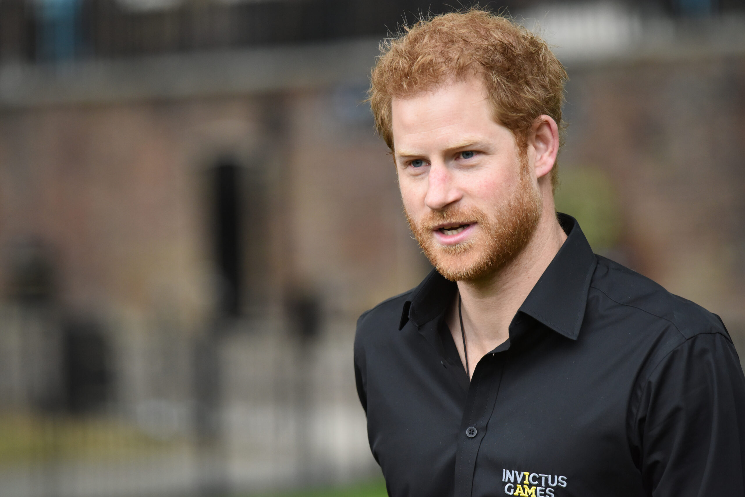 Is Prince Harry gay? Here's a photo of him looking dashing.